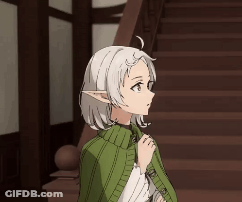 Girl With White Hair In Green Cape And Sweater GIF