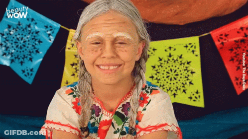 Girl With White Paint Smiling In Front Of Beauty Wow Banner GIF