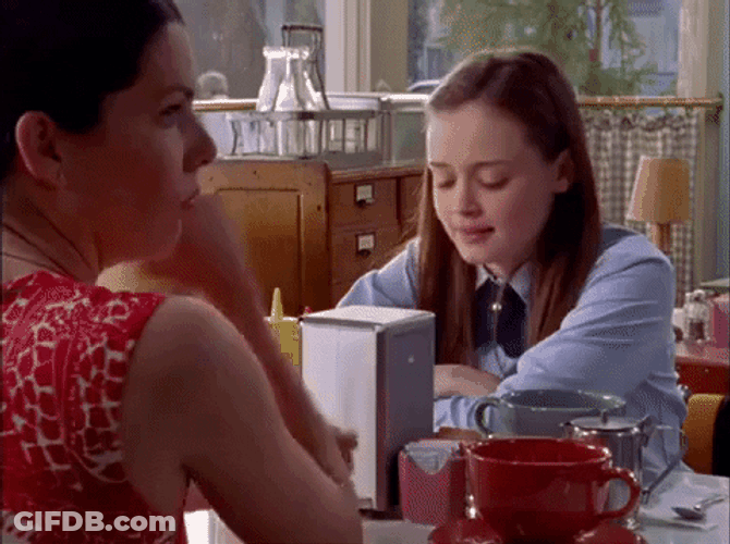 Girl Yawning In Daylight In A Cafeteria GIF