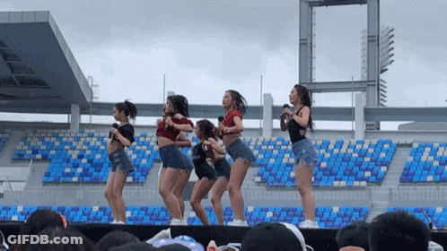 Girls Dancing On Stage In Front Of Crowd GIF