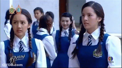 Girls In School Uniforms Standing Together GIF