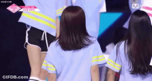 Girls On Stage One In Blue And Yellow Striped Shirt GIF