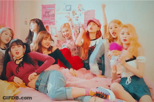 Girls Sitting On Bed With Pink Floyd Poster GIF