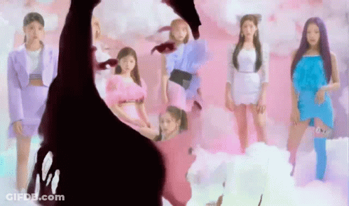 Girls Standing In Front Of Pink Cloud Background GIF