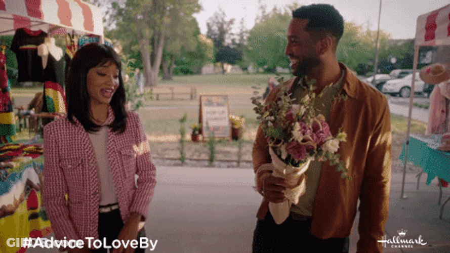 Giving Flowers To Tyra Banks GIF