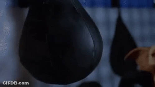 Gizmo From Gremlins Looking At Camera GIF
