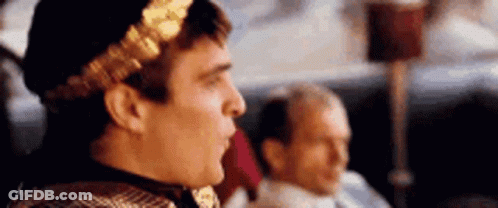 Gladiator Movie Poster Man Holding Sword Strength And Honor GIF