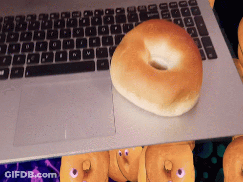 Glass Display Case Filled With Donuts Sauce GIF