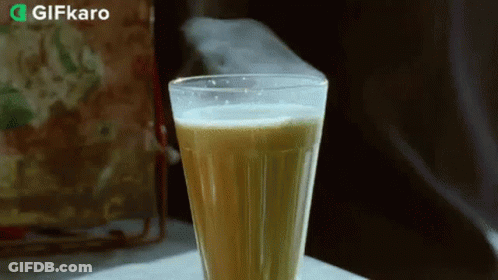 Glass Of Beer On Table With Gifkaro Logo GIF