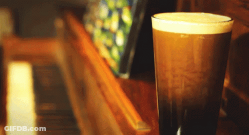 Glass Of Beer On Wooden Table GIF