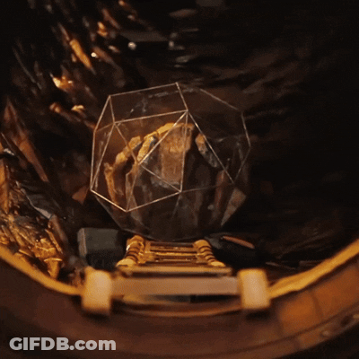 Glass Sphere On Wooden Platform GIF