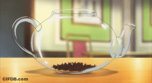 Glass Teapot Filled With Tea Leaves GIF