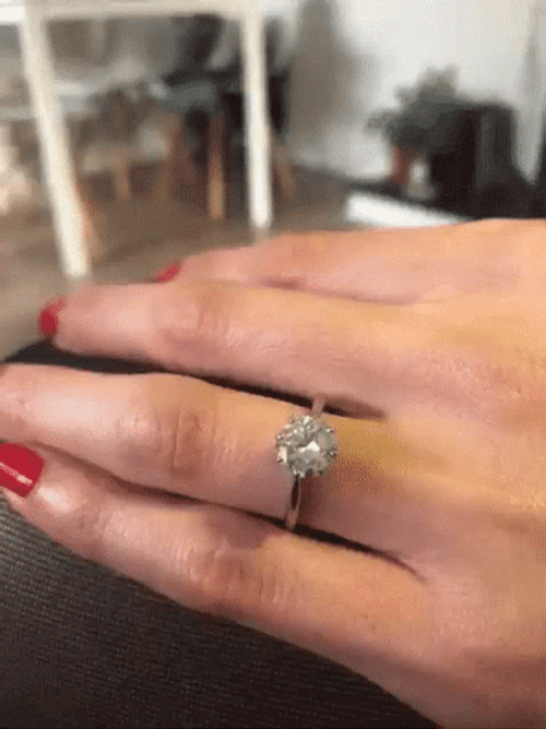 Gleaming Wedding Ring GIF