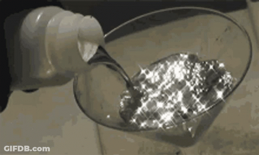 Glitter Water Pouring In Wine Glass GIF