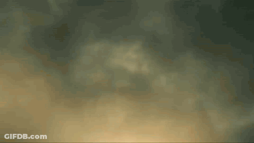 Glowing Light On Dark Background GIF