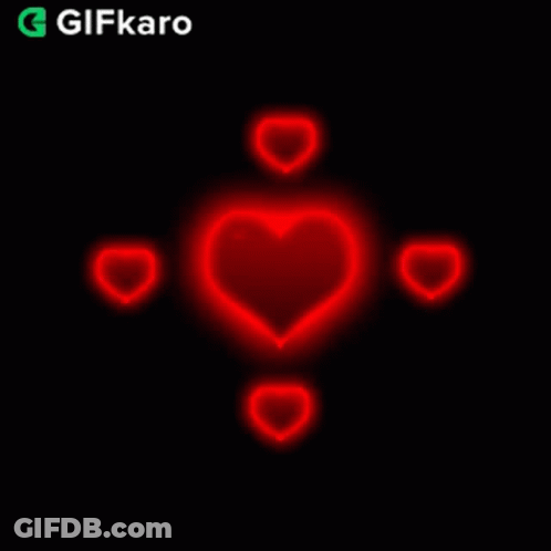 Glowing Red Heart Surrounded By Four Smaller Hearts GIF