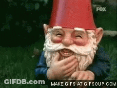 Gnome In Red Hat Laughing Covering Mouth GIF