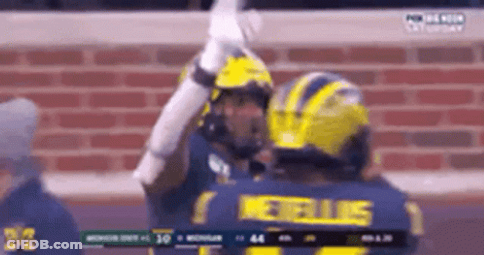 Go Blue Michigan Player Waving GIF