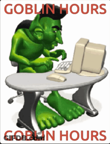 Goblin Sitting At Desk With Computer GIF