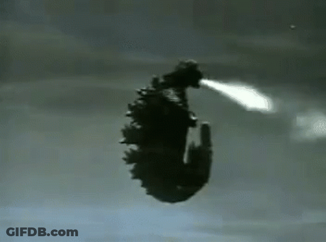 Godzilla Meme Blowing Smoke GIF