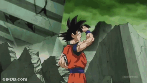 Goku From Dragon Ball Z Is Standing In Front Of A Concrete Wall . GIF