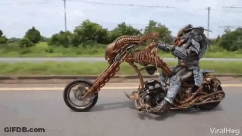 Gold And Silver Motorcycle Large Tire GIF
