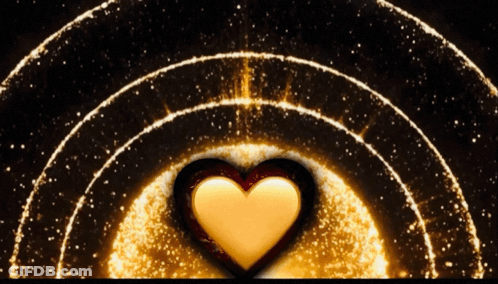 Gold Heart Surrounded By Circles Of Light GIF