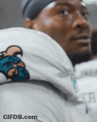 Golden Flashes Football Players Lined Up In Tunnel GIF