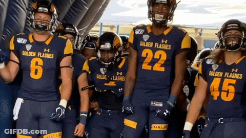 Golden Flashes Football Players Lined Up In Tunnel GIF
