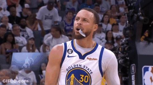 Golden State Warriors Basketball Player Stephen Curry With A Toothbrush In His Mouth GIF