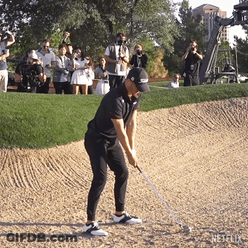 Golfer Hitting Golf Ball In Titleist Hat GIF