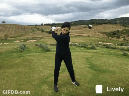 Golfer Swinging Club On Golf Course GIF