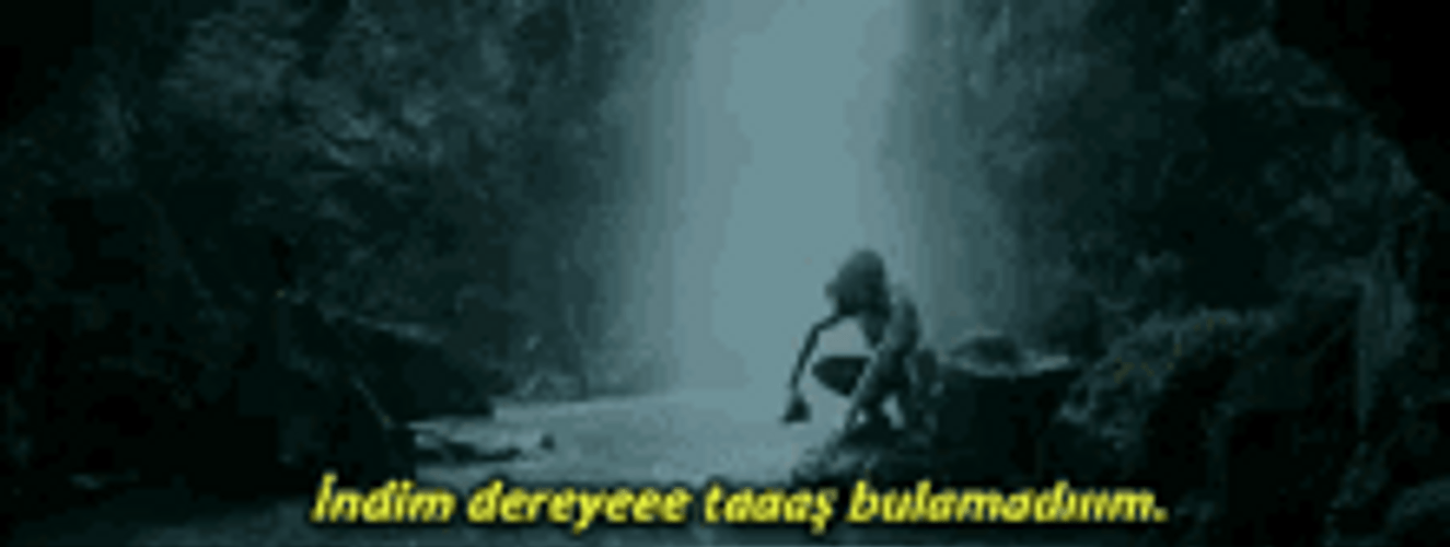 Gollum Dancing Near A Waterfall GIF