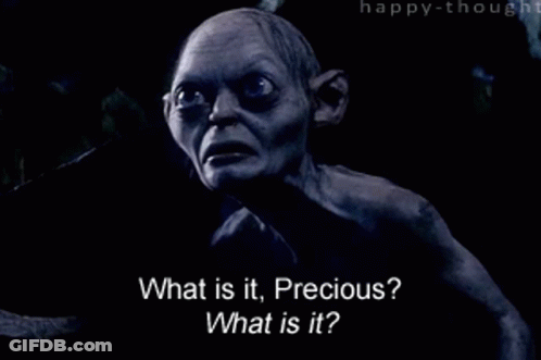 Gollum From The Lord Of The Rings Is Asking What Is It , Precious ? GIF