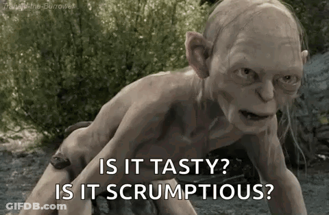 Gollum From The Lord Of The Rings Is Crawling On The Ground And Asking If It Is Tasty Or Scrumptious . GIF