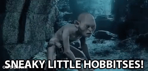 Gollum From The Lord Of The Rings Is Crawling On The Ground In A Cave And Saying `` Sneaky Little Hobbitses ! '' GIF