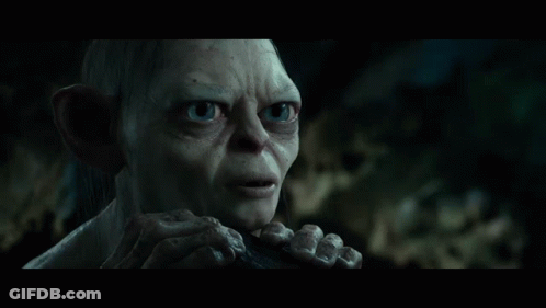 Gollum From The Lord Of The Rings Is Smiling With His Eyes Closed And His Hands On His Face GIF
