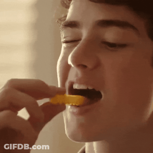 Good Looking Young Guy Enjoying Chip GIF