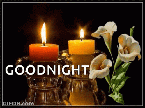Goodnight Card With Two Lit Candles And Flowers GIF