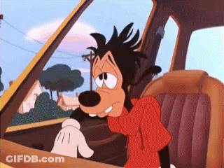 Goofy Cartoon Character Sitting In Car GIF