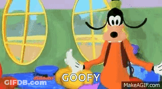 Goofy From Mickey Mouse Clubhouse Is Standing Next To Mickey Mouse In A Bedroom . GIF