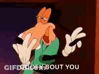 Goofy From Mickey Mouse Is Making A Peace Sign With His Hands . GIF