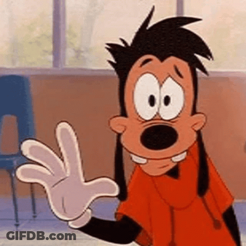 Goofy From Mickey Mouse Is Waving His Hand In A Classroom While Wearing A Glove . GIF