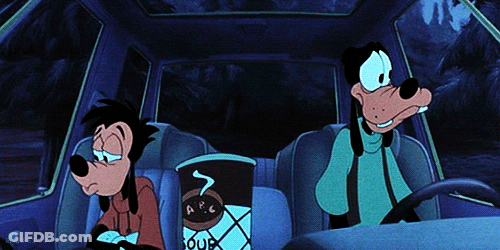 Goofy Is Sitting In The Back Seat Of A Car With A Cup Of Soup GIF