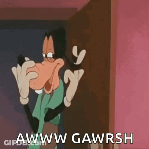 Goofy Is Standing In Front Of A Door And Making A Face . GIF