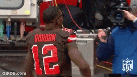 Gordon In Brown And Red Jersey Number 12 GIF