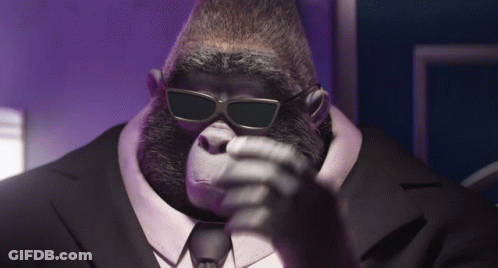 Gorilla In Sunglasses And Suit Pointing GIF