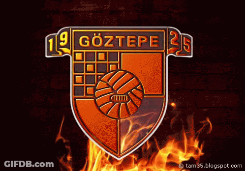Göztepe Logo Surrounded By Flames On Dark Background GIF