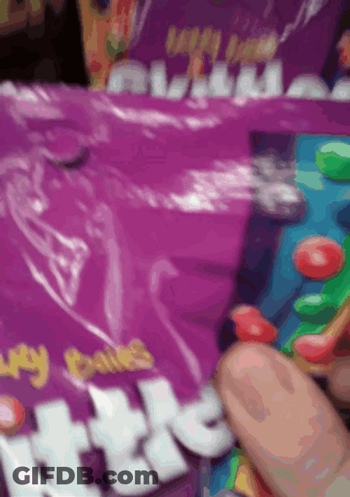 Grab A Skittles Candy Pack GIF