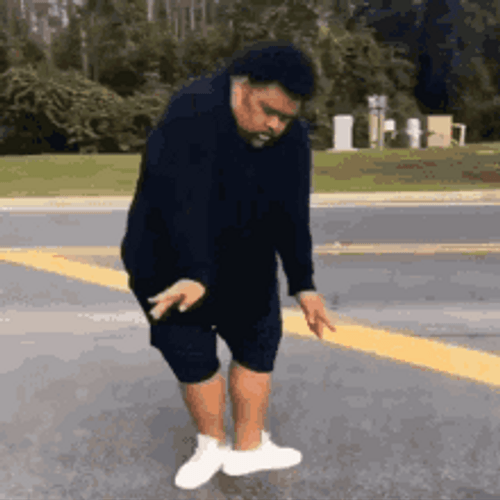 Graceful Guy In Parking Lot Funny Dancing GIF